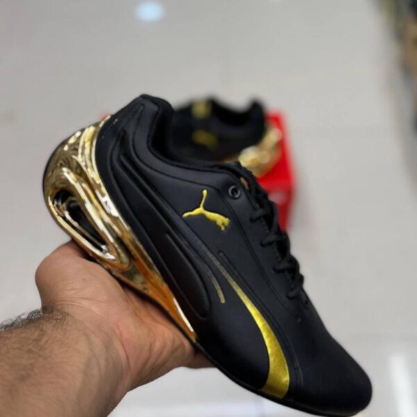 کفش کتونی مردانه پوما Puma future super Gt مشکی طلایی